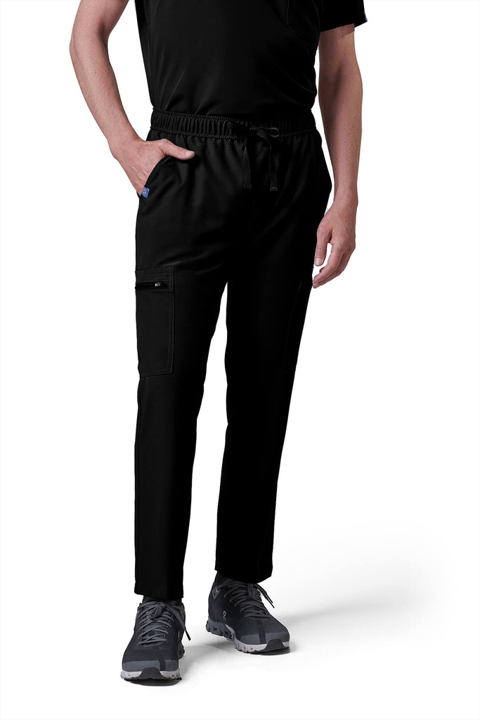 Man wearing MedTailor men's scrub pants in Jet Black color fabric