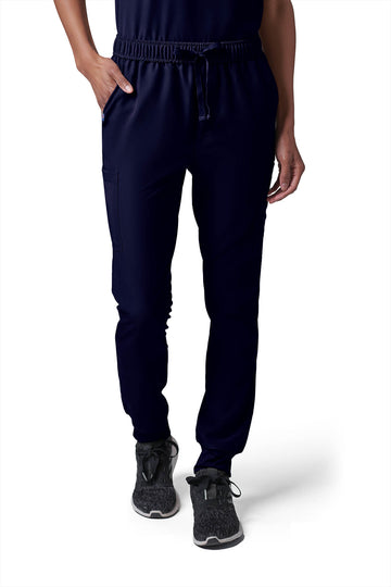 Woman wearing MedTailor women's custom custom scrub pants in Navy Blue color fabric